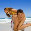 Playful couple at beach